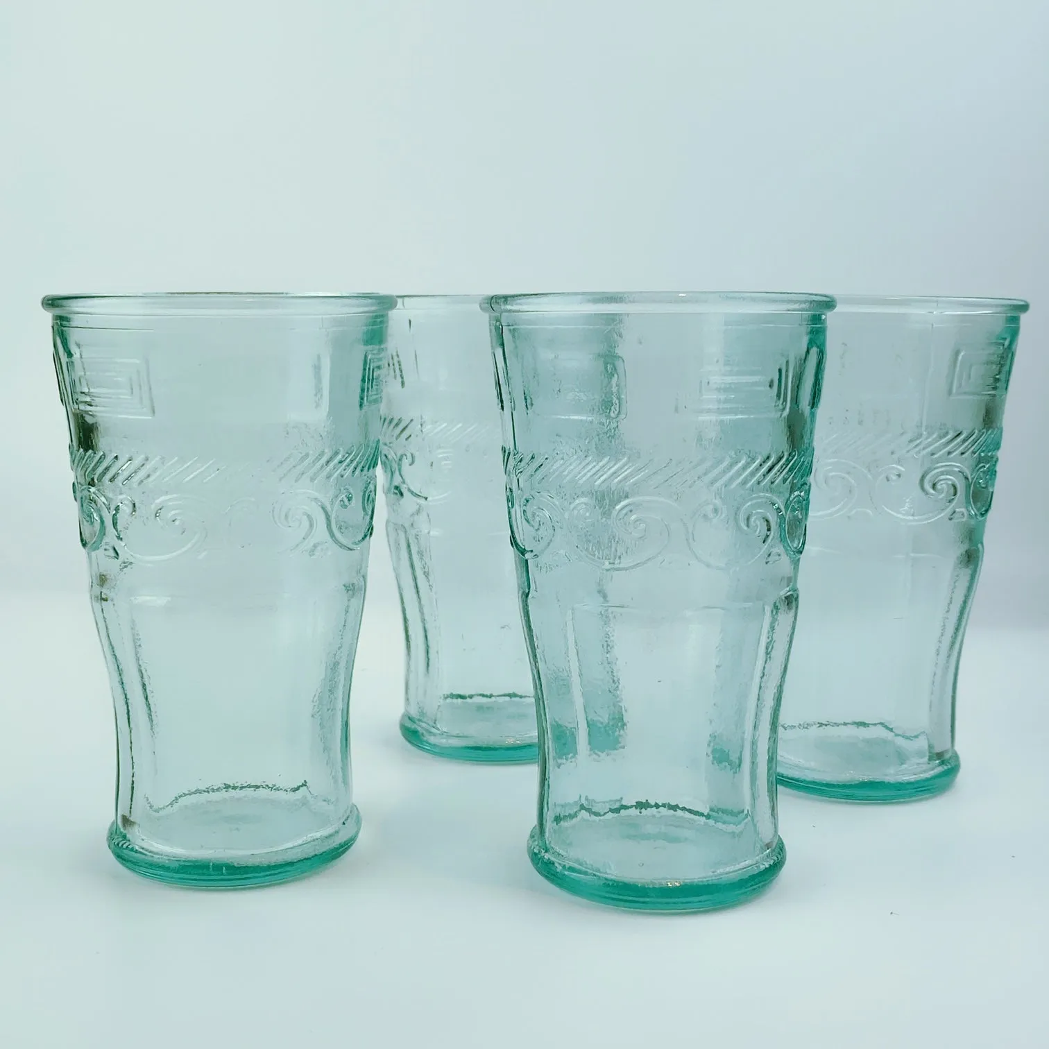 Authentic San Miguel Drinking Glasses 100% Recycled Long Glass - Set of 4 (14 oz) Swirling