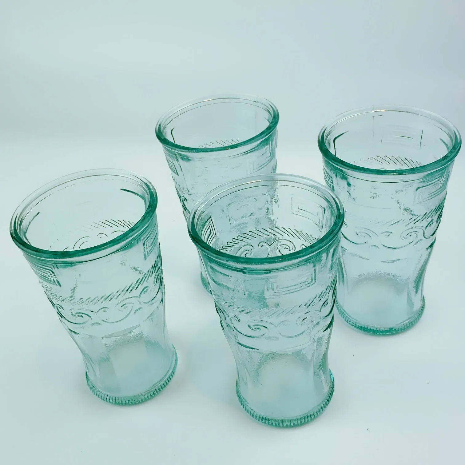 Authentic San Miguel Drinking Glasses 100% Recycled Long Glass - Set of 4 (14 oz) Swirling